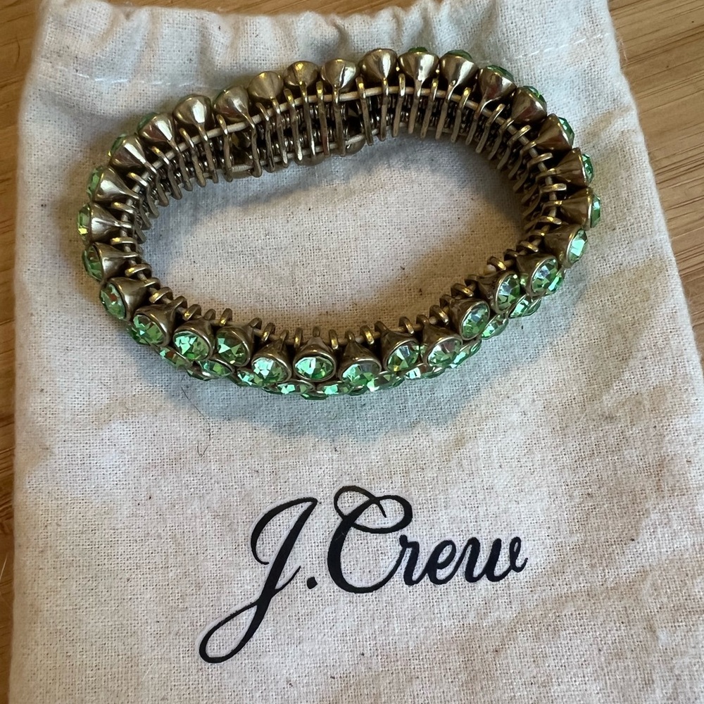 NWOT green and gold stretch sparkle bracelet.